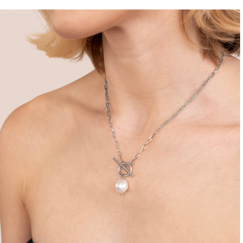 Eva's Radiant Pearl Charm