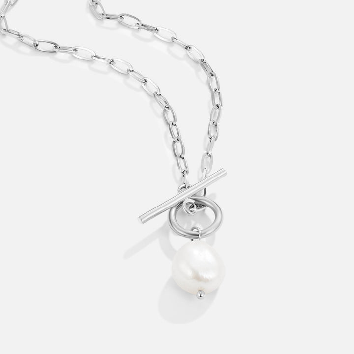 Eva's Radiant Pearl Charm